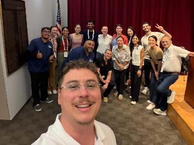Scott smiling with course participants.