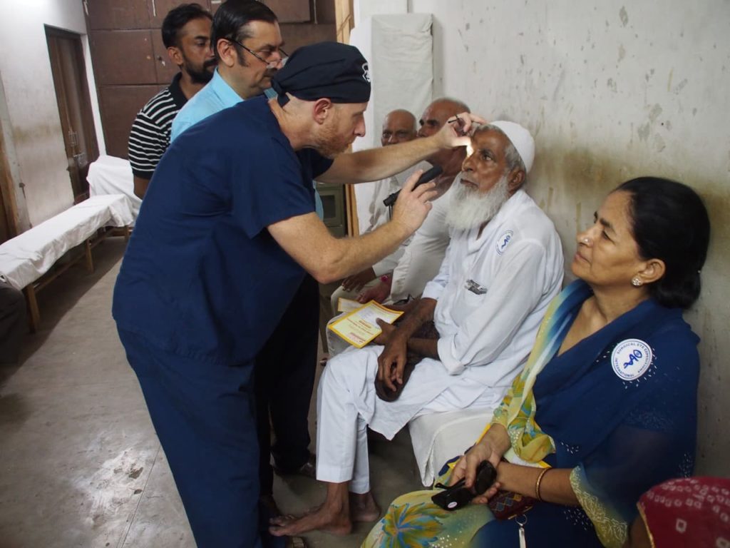 Dr. Shatz, SEE's new board member checking on a patient.